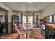 Dining room featuring a glass table with wood floors at 1617 E Kelly St, Indianapolis, IN 46203
