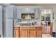 Kitchen featuring a double sink and wooden cabinets at 1617 E Kelly St, Indianapolis, IN 46203