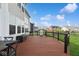 Spacious back deck featuring black metal railings and ample space for outdoor dining and relaxing at 16264 Red Clover Ln, Noblesville, IN 46062