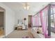 Cozy bedroom with a four-poster bed, vanity, and decorative accents creating a comfortable space at 16264 Red Clover Ln, Noblesville, IN 46062