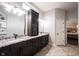 Bright bathroom with custom cabinetry and granite countertops, offering ample storage and a luxurious feel at 1648 Rossmay Dr, Westfield, IN 46074