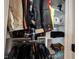Organized closet with ample hanging space and shelves for clothing and accessories at 1648 Rossmay Dr, Westfield, IN 46074