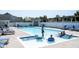 Community pool featuring zero entry and lounge areas, perfect for relaxation at 1648 Rossmay Dr, Westfield, IN 46074