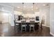 Kitchen with granite countertops, an island with seating, and stainless steel appliances at 1648 Rossmay Dr, Westfield, IN 46074