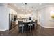 Gourmet kitchen featuring a large island with seating and white cabinets at 1648 Rossmay Dr, Westfield, IN 46074