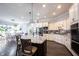 Spacious kitchen featuring a large island with granite countertops and stainless steel appliances at 1648 Rossmay Dr, Westfield, IN 46074