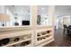 Open-concept living room with stylish decor and a glimpse into the dining area at 1648 Rossmay Dr, Westfield, IN 46074
