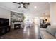 Spacious living room with a stone fireplace and an open concept floor plan at 1648 Rossmay Dr, Westfield, IN 46074