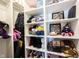 Organized storage featuring multiple shelves filled with yarn and other crafting supplies at 1648 Rossmay Dr, Westfield, IN 46074