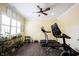 Bright workout room with modern exercise equipment, natural light, and stylish decor at 1648 Rossmay Dr, Westfield, IN 46074