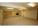 Finished basement with neutral carpet, recessed lights, and additional seating area at 17003 Whitebark Ct, Westfield, IN 46074