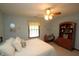 Bedroom features carpet, a ceiling fan, a large closet, and neutral paint at 17003 Whitebark Ct, Westfield, IN 46074