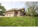 Large three car garage and nicely manicured lawn on a beautiful house at 17003 Whitebark Ct, Westfield, IN 46074