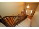View of a stair case and entrance, with a pendant light and a glimpse of the front door at 17003 Whitebark Ct, Westfield, IN 46074