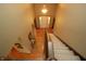 Bright foyer view with staircase and hardwood floors, creating a welcoming entrance at 17003 Whitebark Ct, Westfield, IN 46074