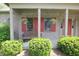 Inviting front porch featuring a bench and hanging flower baskets, perfect for relaxing outdoors at 17003 Whitebark Ct, Westfield, IN 46074