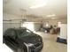Spacious garage with ample storage, garage door openers and parking for multiple vehicles at 17003 Whitebark Ct, Westfield, IN 46074