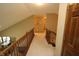 Upstairs hallway features nice railing, neutral paint, and carpet at 17003 Whitebark Ct, Westfield, IN 46074