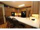 Charming kitchen featuring wood cabinets, light countertops, and built-in appliances for efficient cooking at 17003 Whitebark Ct, Westfield, IN 46074