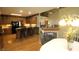 Open concept kitchen featuring a breakfast bar and views into the living room at 17003 Whitebark Ct, Westfield, IN 46074