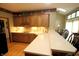 This kitchen showcases wood cabinets, light countertops, and stainless appliances, blending style with functionality at 17003 Whitebark Ct, Westfield, IN 46074