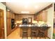 A well-equipped kitchen with wooden cabinetry, modern appliances, and a functional layout for efficient cooking at 17003 Whitebark Ct, Westfield, IN 46074