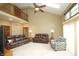 Bright living room with high ceilings, skylights, comfortable seating, and a cozy atmosphere at 17003 Whitebark Ct, Westfield, IN 46074