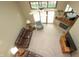Living room features a fireplace, ceiling fan, and comfortable seating with bright natural light at 17003 Whitebark Ct, Westfield, IN 46074
