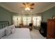 Comfortable main bedroom featuring a bed, sitting area, and plenty of natural light from the windows at 17003 Whitebark Ct, Westfield, IN 46074