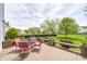 Spacious back deck with comfortable patio furniture, offering an inviting outdoor living area at 1831 Whisperwood Trl, Danville, IN 46122