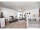 Second floor exercise room featuring treadmill, bike and large window at 1831 Whisperwood Trl, Danville, IN 46122