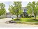 Charming two-story home with a well-manicured lawn, a two car garage, and lovely landscaping at 1831 Whisperwood Trl, Danville, IN 46122