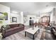 Open-concept living and dining area with stylish furnishings and plenty of natural light at 1831 Whisperwood Trl, Danville, IN 46122