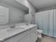 Bathroom with double sink vanity and tiled floors at 192 Bluestem Ln, Whiteland, IN 46184