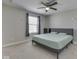 Bedroom featuring a ceiling fan, and a large window with blinds at 192 Bluestem Ln, Whiteland, IN 46184