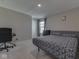 Bedroom with a view and a chair at 192 Bluestem Ln, Whiteland, IN 46184