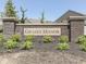 Well-maintained entrance to the community featuring a welcoming sign at 192 Bluestem Ln, Whiteland, IN 46184