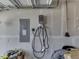 Garage with EV charger and electrical panel at 192 Bluestem Ln, Whiteland, IN 46184