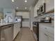 Modern kitchen with stainless steel appliances, granite countertops and backsplash at 192 Bluestem Ln, Whiteland, IN 46184