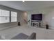 Inviting living room with carpet and a TV on display at 192 Bluestem Ln, Whiteland, IN 46184