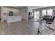 Open-concept living space with modern kitchen and spacious living area at 192 Bluestem Ln, Whiteland, IN 46184