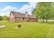 Expansive backyard featuring a wood deck perfect for outdoor living and entertaining at 1934 Constitution St, Greenfield, IN 46140
