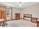Bright bedroom featuring neutral walls, a door to the backyard, and wood furniture at 1934 Constitution St, Greenfield, IN 46140