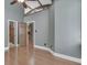 A bedroom with hardwood floors, high ceilings, and wooden beam features at 196 E Madison St, Franklin, IN 46131