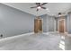 Spacious bedroom with hardwood flooring and a ceiling fan at 196 E Madison St, Franklin, IN 46131