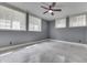 Bedroom with natural light from three windows and a ceiling fan at 196 E Madison St, Franklin, IN 46131