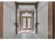Bright hallway with tile floors, wood trim, and a view to the front door, creating an inviting entrance at 196 E Madison St, Franklin, IN 46131