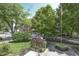 Captivating street view with lush trees and greenery, showcasing the serene neighborhood setting at 196 E Madison St, Franklin, IN 46131