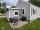 Backyard with gravel patio and outdoor seating at 209 N Lincoln St, Martinsville, IN 46151