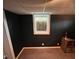 Finished basement room offering versatile space with painted walls and a small window at 209 N Lincoln St, Martinsville, IN 46151